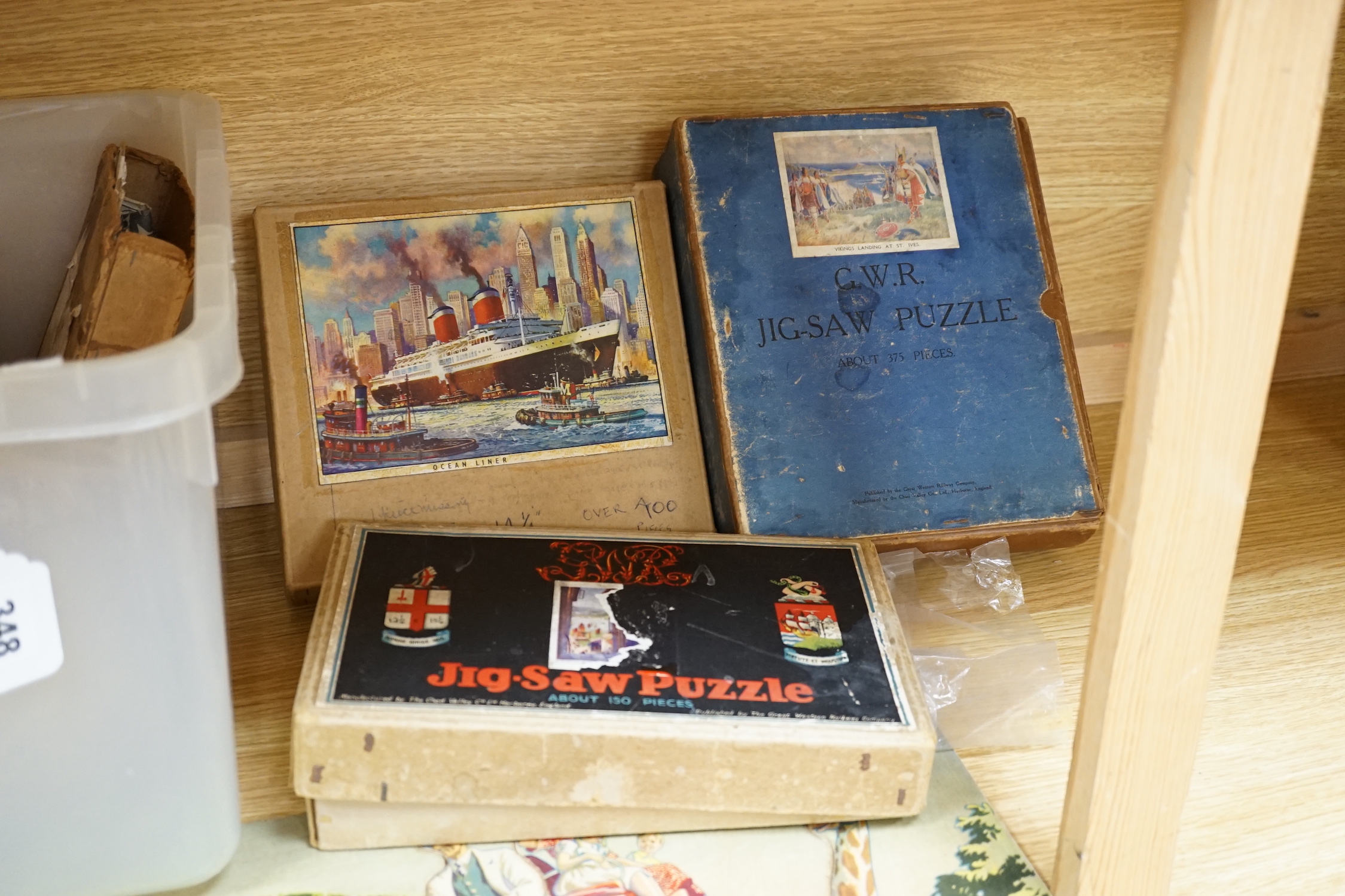 A quantity of various jigsaw puzzles including an animalistic example by Raymond Sheppard